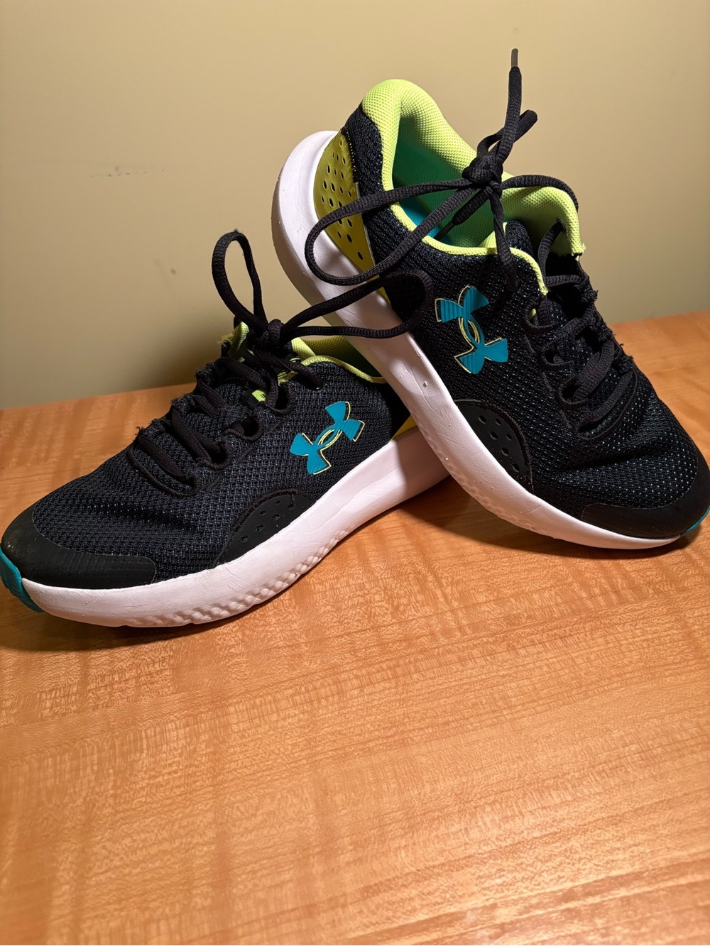 Under Armour Kids Black Sneakers with Teal and Neon Yellow Accents